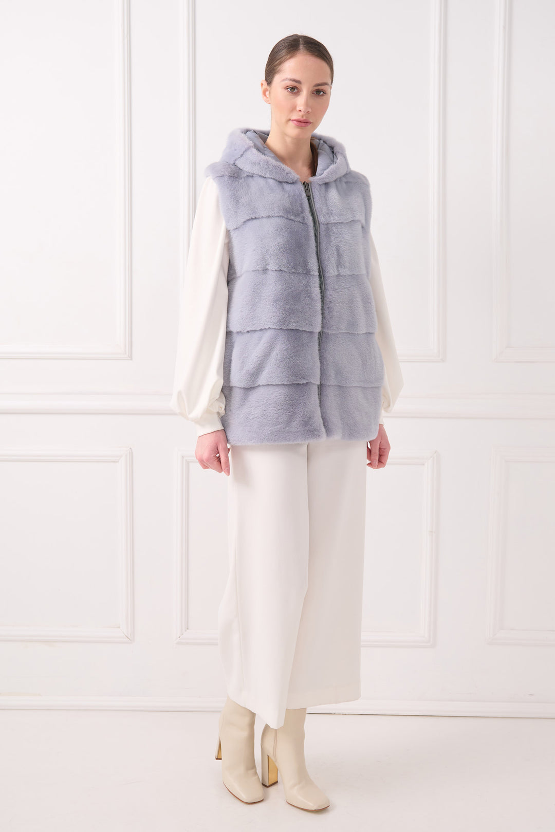Veste sans manches matelassée à capuche avec vison