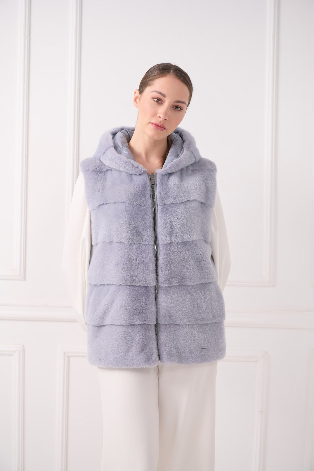 Veste sans manches matelassée à capuche avec vison