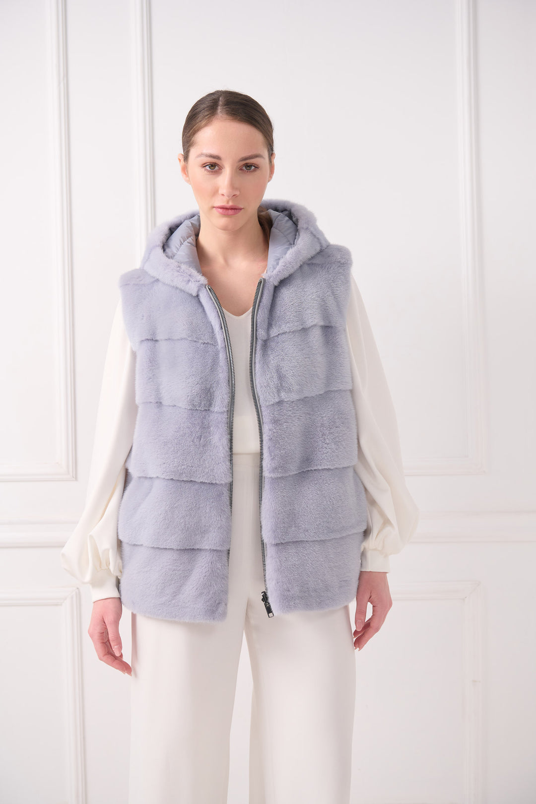 Veste sans manches matelassée à capuche avec vison