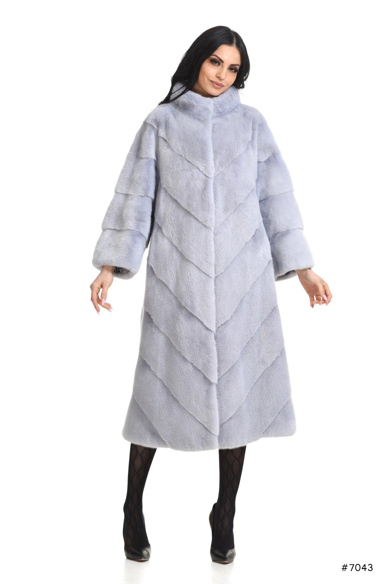 Long diagonal worked mink coat with stand up collar