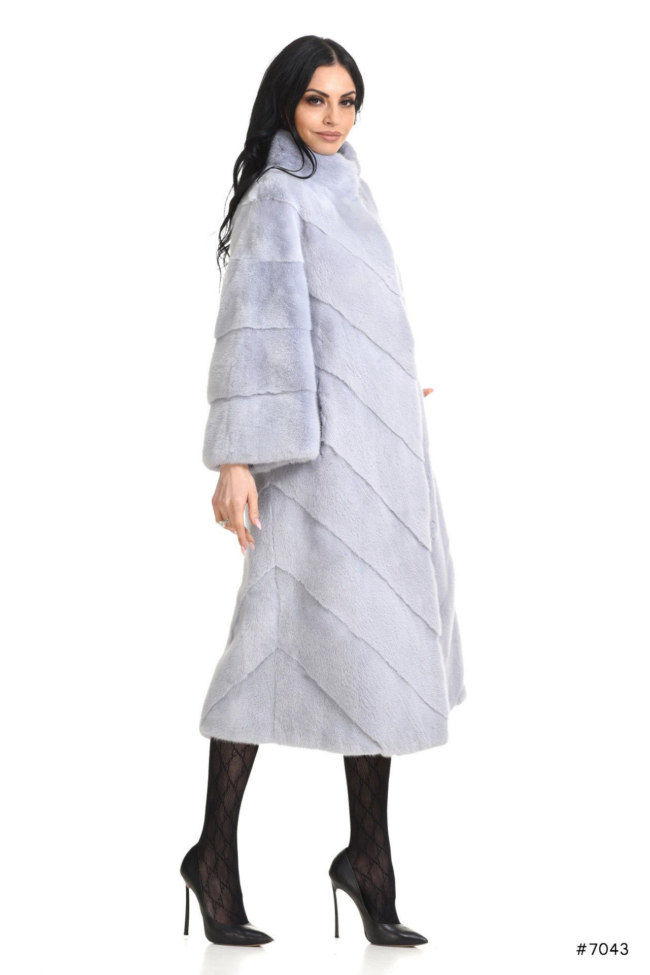 Long diagonal worked mink coat with stand up collar